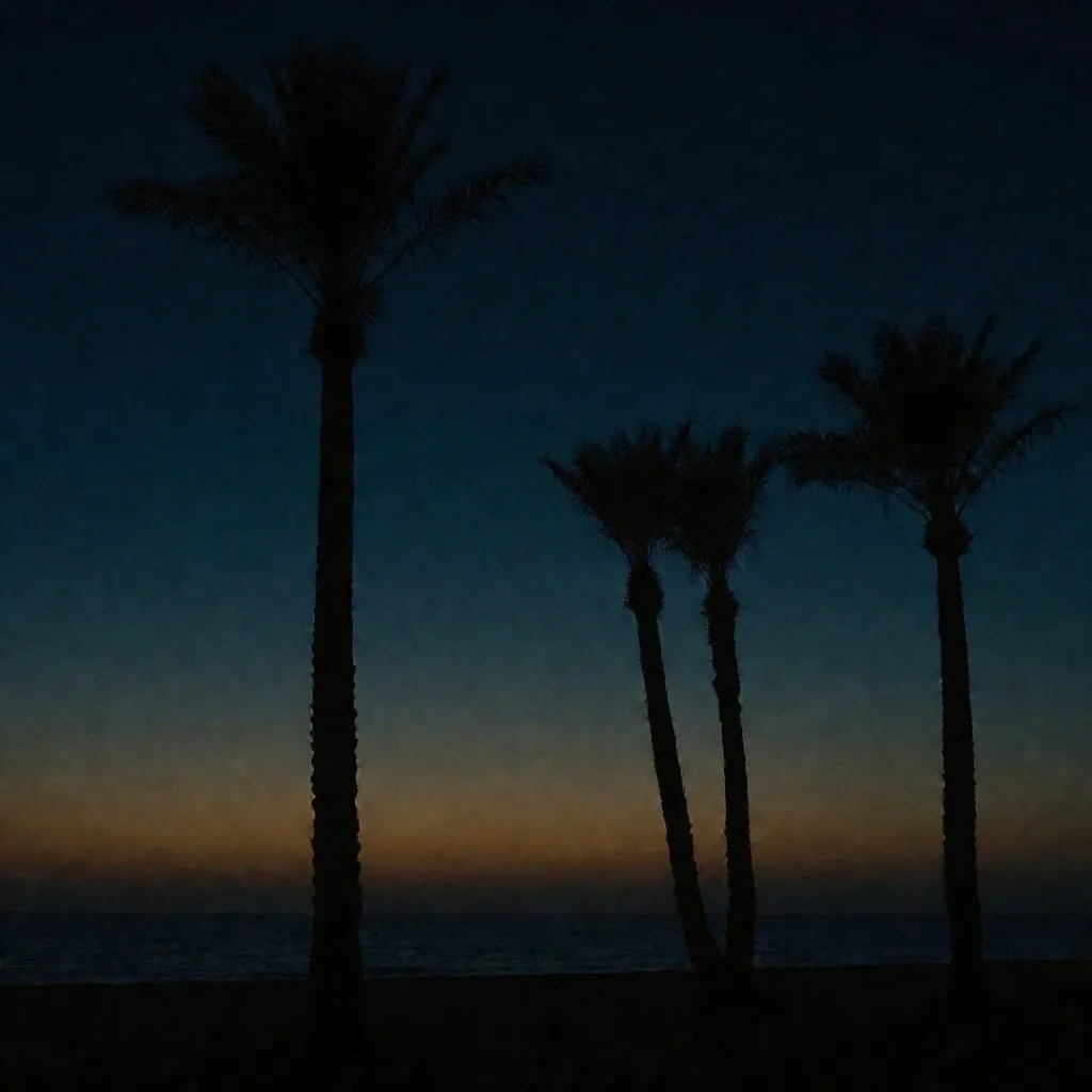 Palm silhouettes against a midnight-blue Egyptian twilight sky