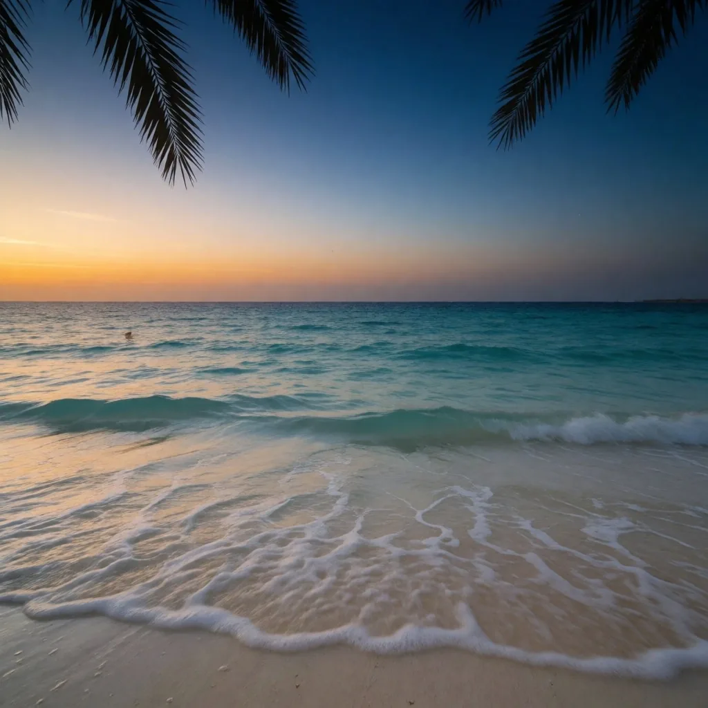 Quiet Red Sea shoreline at dusk with palm fronds framing the view